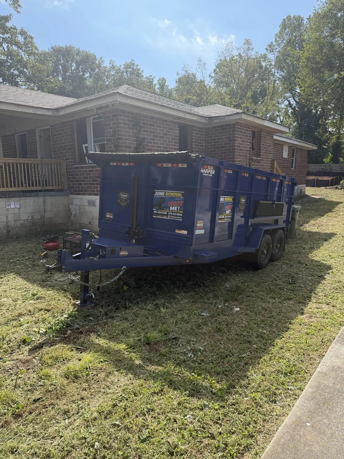 Front view of TPM 20-yard dump trailer at Atlanta renovation project