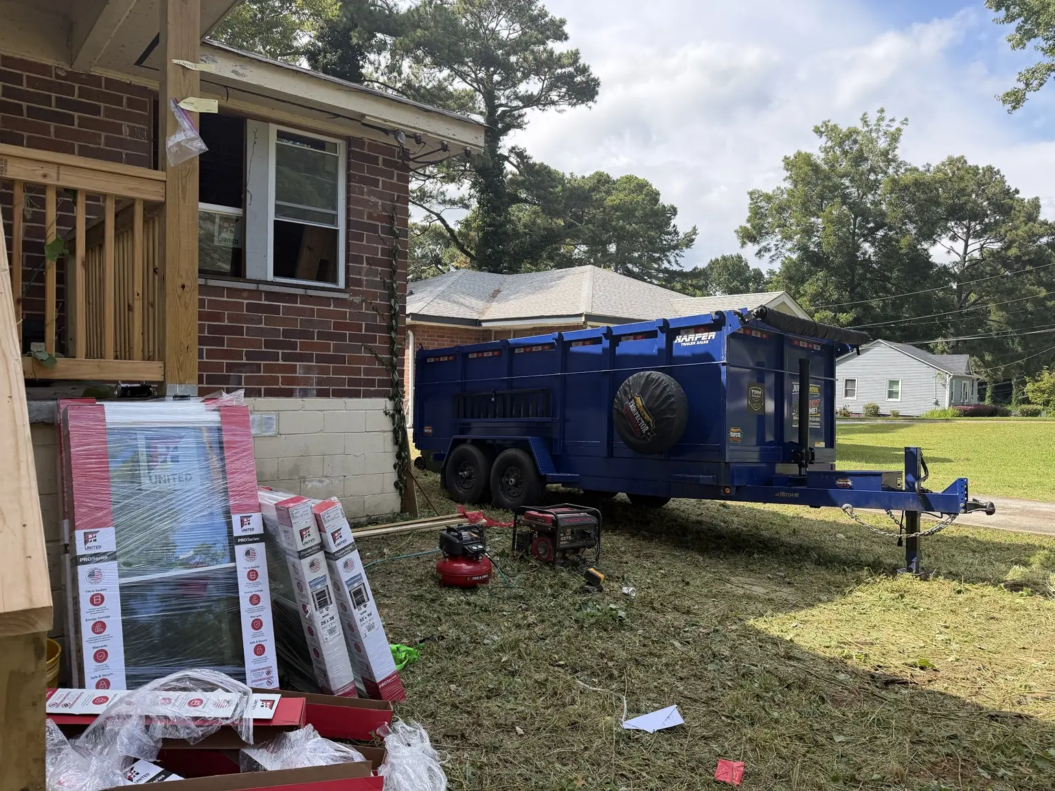 Renovation materials and TPM dump trailer at Atlanta Georgia project