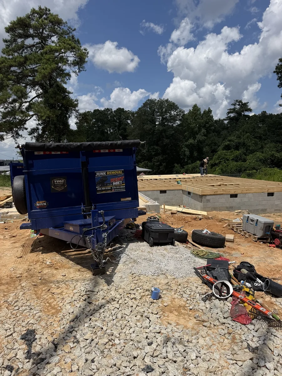 TPM Trailers dump trailer at a Douglasville commercial construction framing project